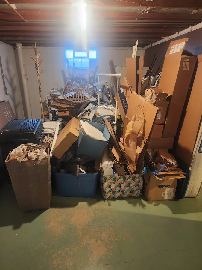 Roll-off dumpster container at job site for 2 Yard Dumpster Rental in Eureka